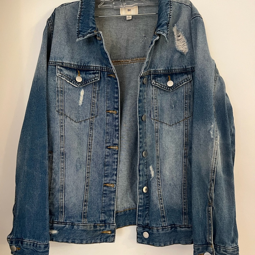 Distressed denim jacket
